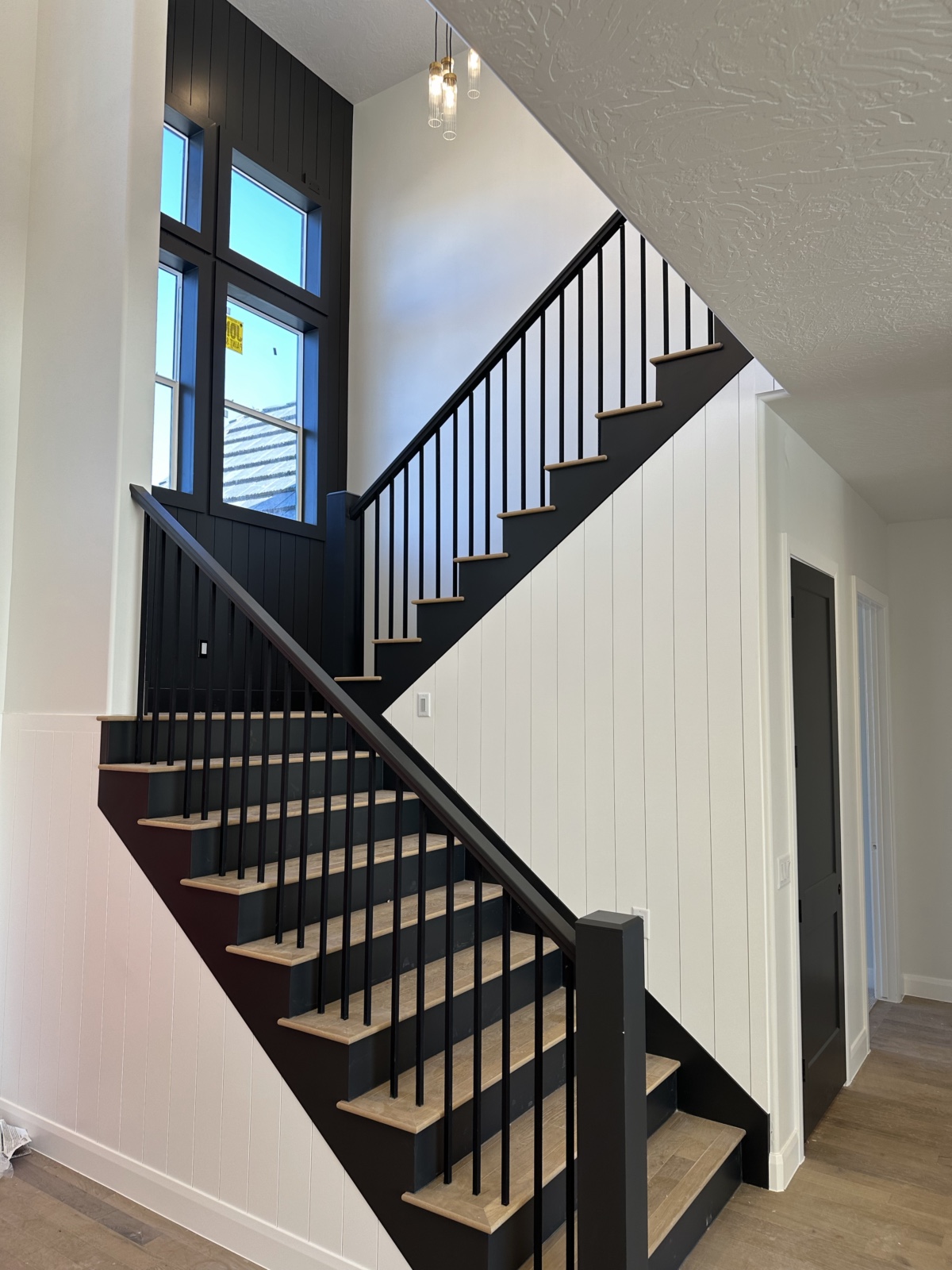Finished stairwell with wood treads